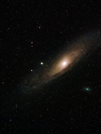 A gold-tinted galaxy in the stars